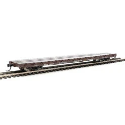 Walthers Mainline 910-5344 - 60' Pullman-Standard Flatcar - Ready To Run -- Trailer-Train (Farm Machinery Service; Brown, Yellow TT Logo) OTTX 90147 - HO Scale